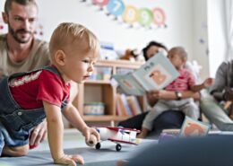 Little Boy Playing In A Classroom