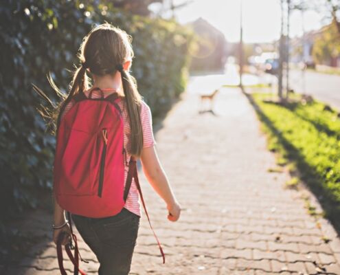 Girl Walking To School