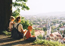 Family On Background Of Ljubljana, Slovenia, Europe.